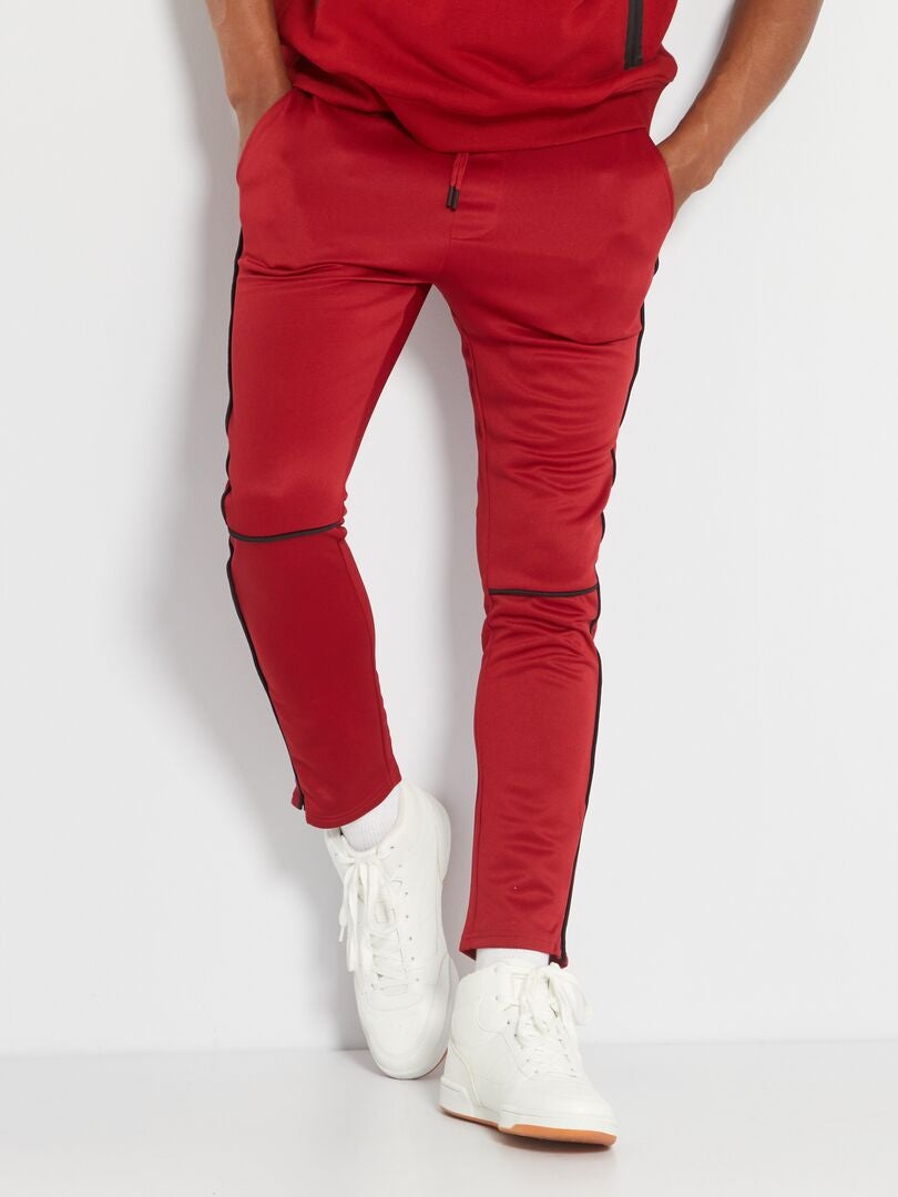 Joggers con stampa Rosso Farfetch Abbigliamento Pantaloni e jeans Pantaloni Joggers 